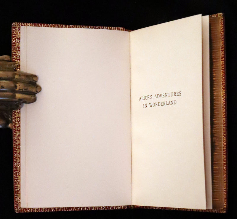 1924 Miniature Edition Book set bound by Zaehnsdorf - Alice's Adventures in Wonderland [with] Through the Looking Glass by Lewis Carroll.