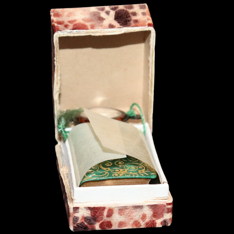1920 Rare Miniature 1.5" X 1" Arabic Book - The Koran (Quran) published by Hans Steinbrener with magnifying lens.