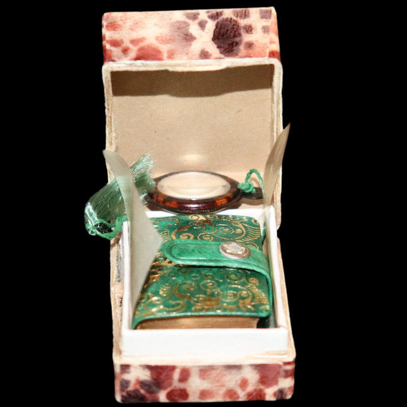 1920 Rare Miniature 1.5" X 1" Arabic Book - The Koran (Quran) published by Hans Steinbrener with magnifying lens.