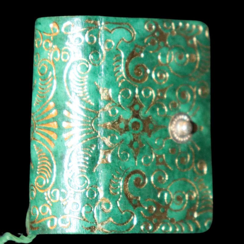 1920 Rare Miniature 1.5" X 1" Arabic Book - The Koran (Quran) published by Hans Steinbrener with magnifying lens.