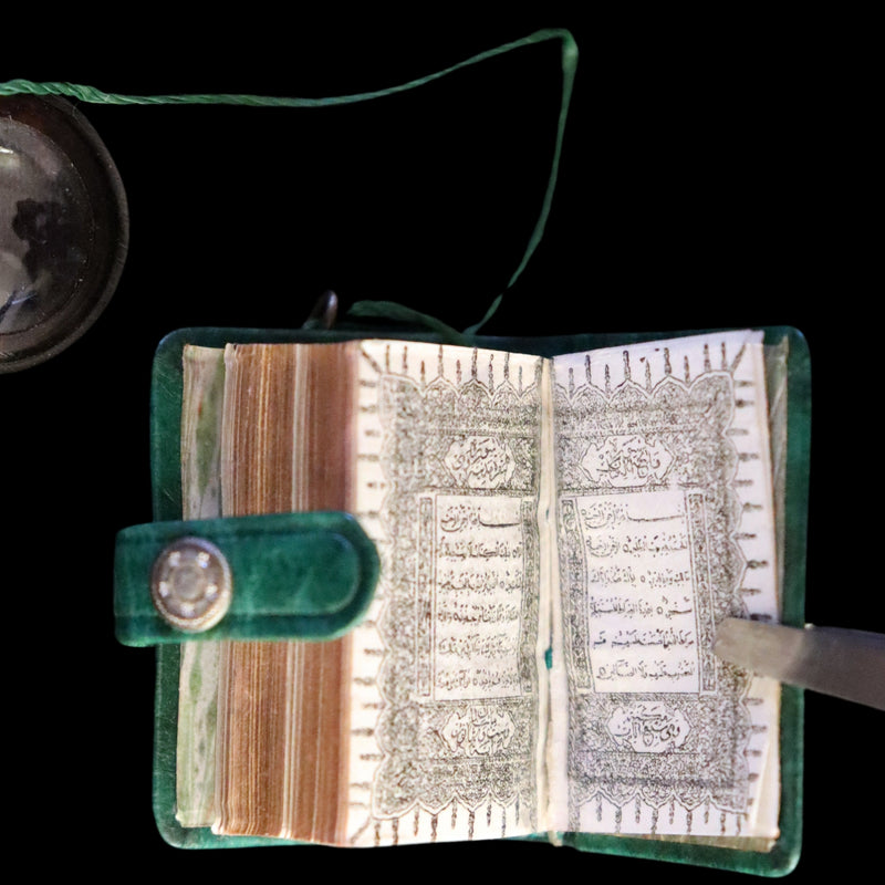 1920 Rare Miniature 1.5" X 1" Arabic Book - The Koran (Quran) published by Hans Steinbrener with magnifying lens.