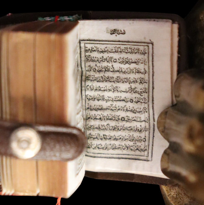 1920 Rare Miniature 1.5" X 1" Arabic Book - The Koran (Quran) published by Hans Steinbrener with magnifying lens.