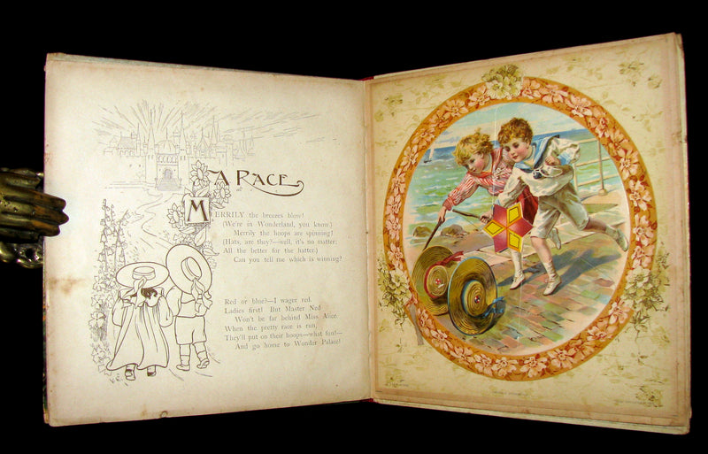 1899 Scarce Nister Revolving Toy Book - WONDERLAND PICTURES - 6 chromolithographed volvelles.