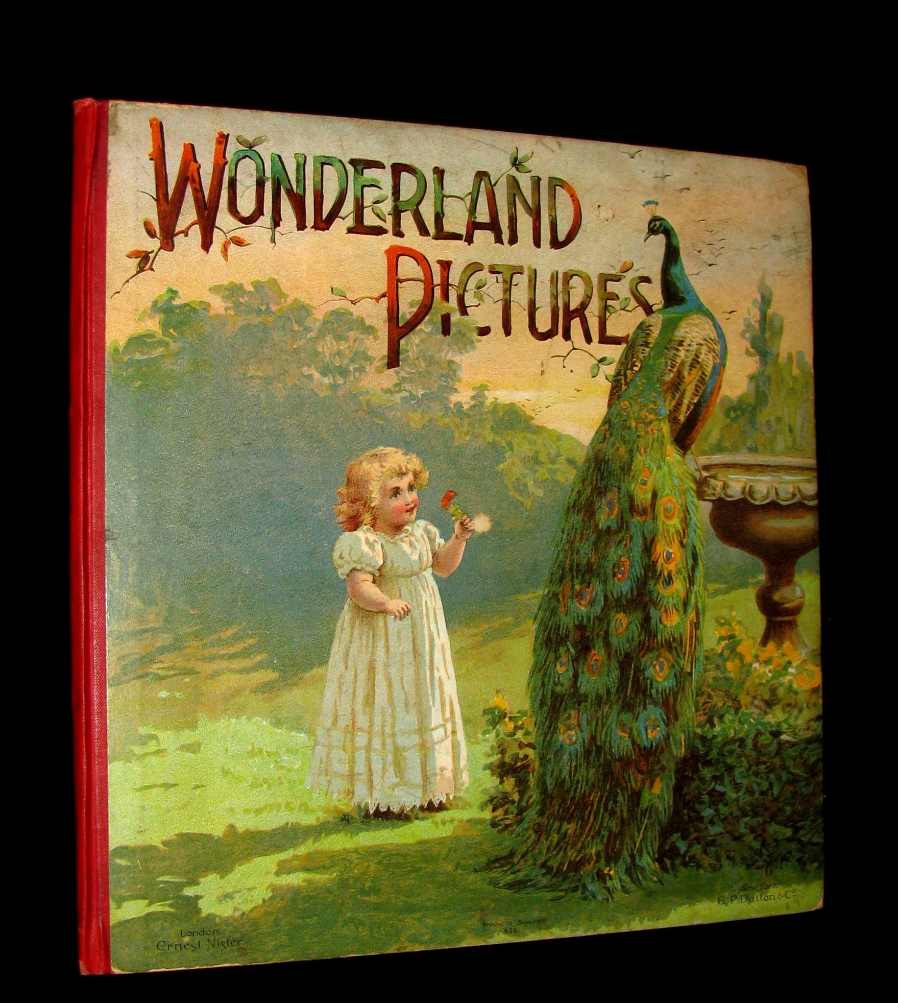 1899 Scarce Nister Revolving Toy Book - WONDERLAND PICTURES - 6 chromolithographed volvelles.
