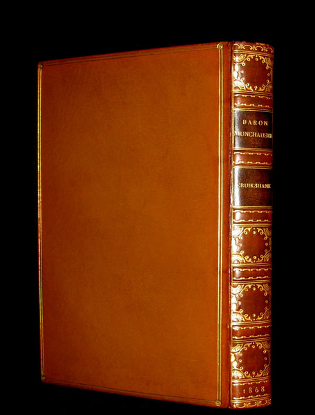 1868 Nice Bartlett & Co Binding - The Travels and Surprising Adventures of Baron MUNCHAUSEN. Illustrated in COLOR by Cruikshank.