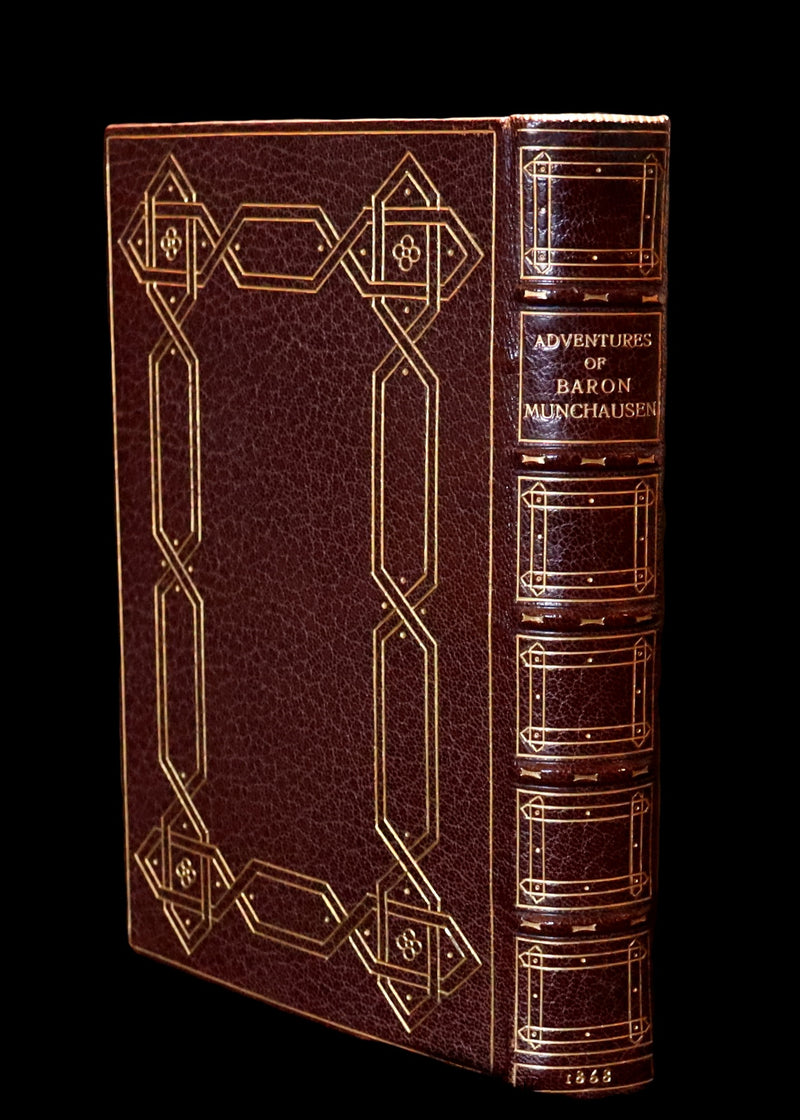 1868 Fine Bayntun-Riviere Binding - The Travels & Surprising Adventures of Baron MUNCHAUSEN. Illustrated in COLOR by Cruikshank.