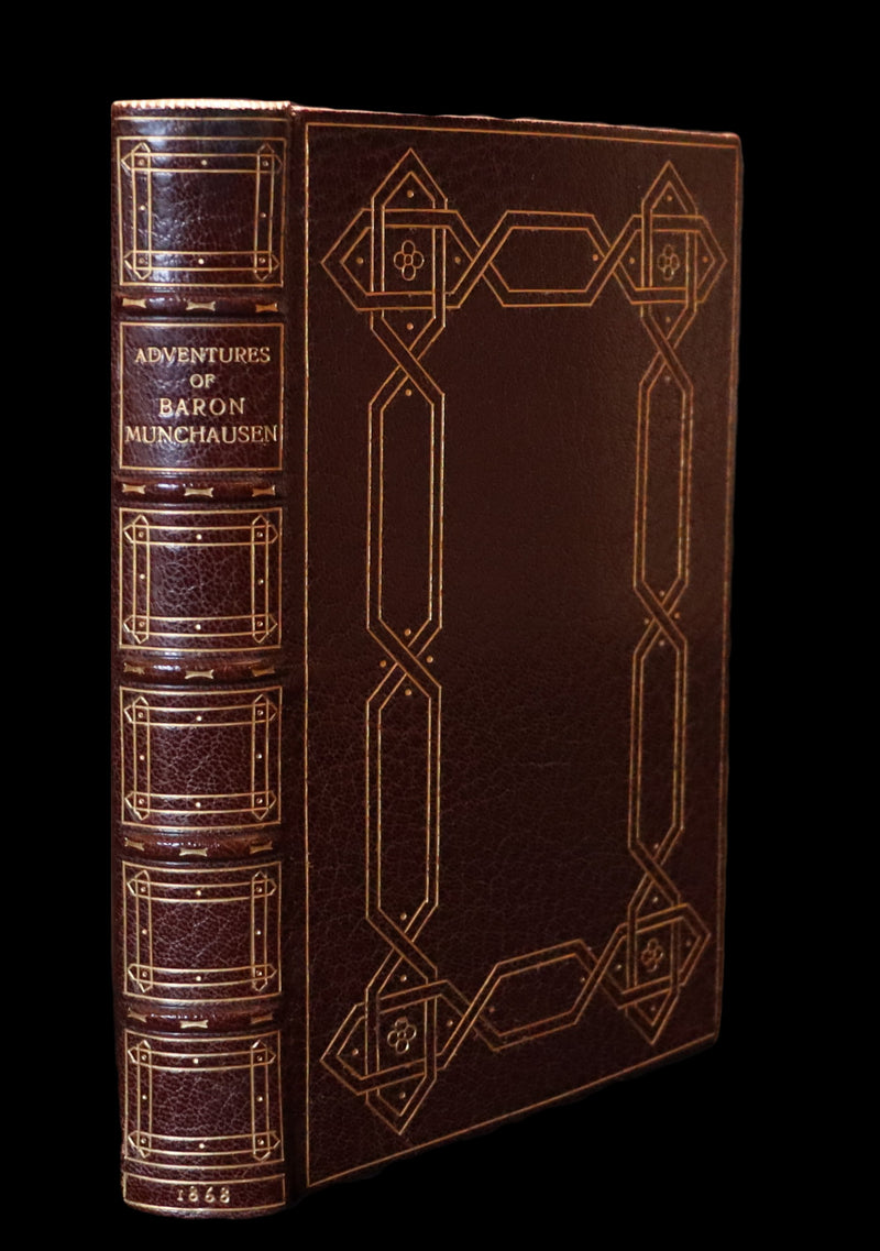 1868 Fine Bayntun-Riviere Binding - The Travels & Surprising Adventures of Baron MUNCHAUSEN. Illustrated in COLOR by Cruikshank.