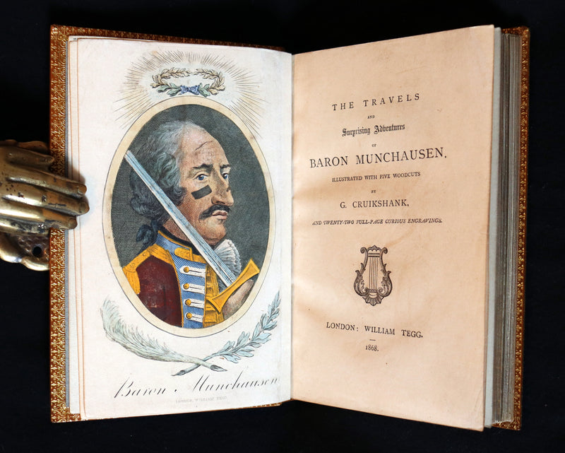1868 Rare Book bound by Morrell  - The Travels and Surprising Adventures of Baron MUNCHAUSEN. Illustrated by Cruikshank.