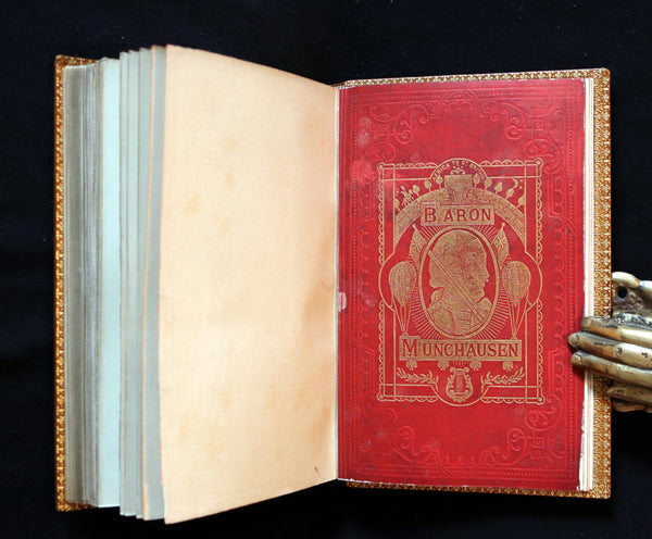 1868 Rare Book bound by Morrell  - The Travels and Surprising Adventures of Baron MUNCHAUSEN. Illustrated by Cruikshank.