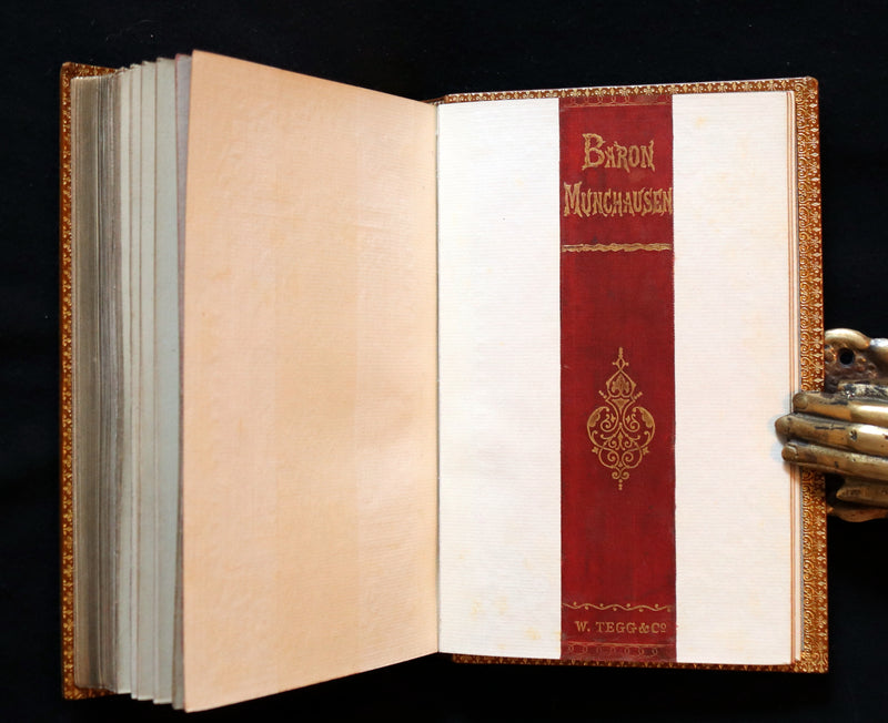 1868 Rare Book bound by Morrell  - The Travels and Surprising Adventures of Baron MUNCHAUSEN. Illustrated by Cruikshank.