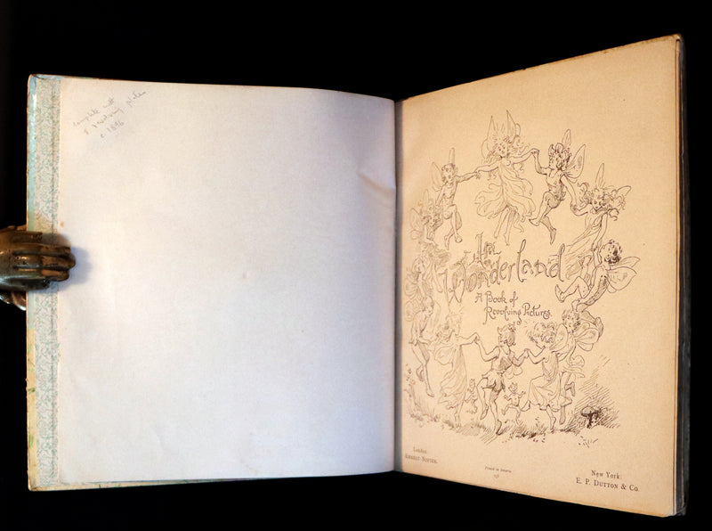 1896 Scarce Nister Revolving Toy Book - IN WONDERLAND with 8 chromolithographed volvelles.