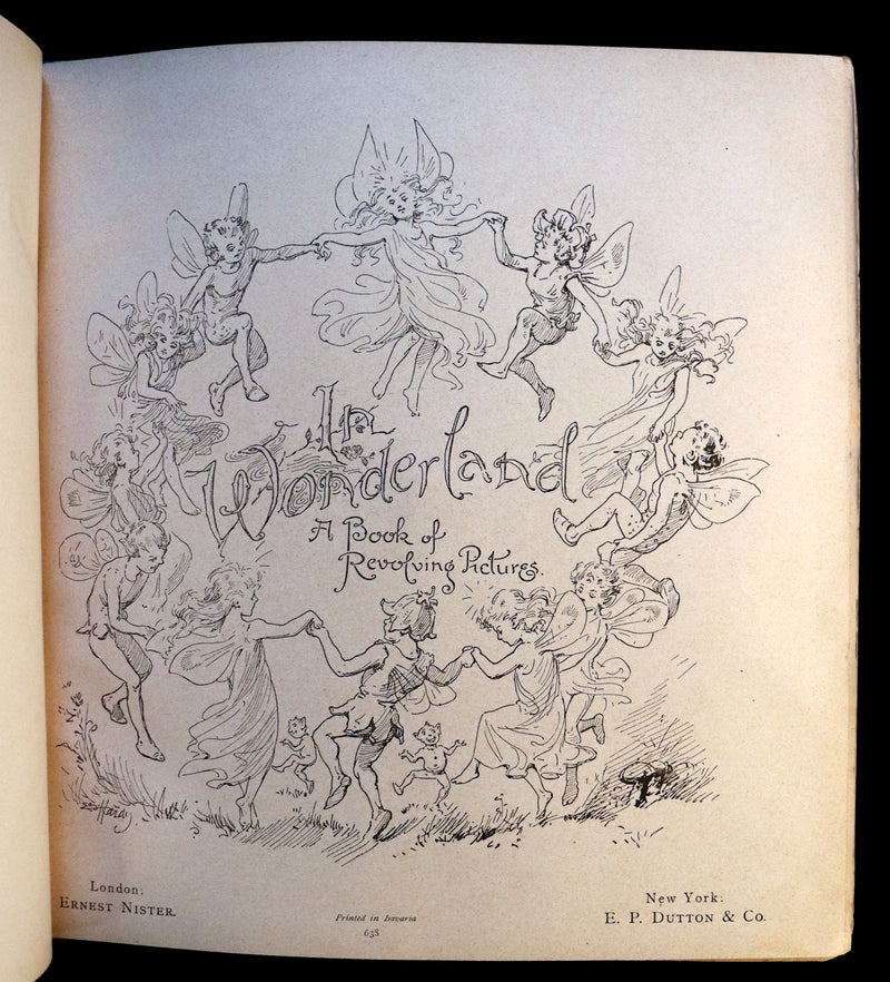 1896 Scarce Nister Revolving Toy Book - IN WONDERLAND with 8 chromolithographed volvelles.