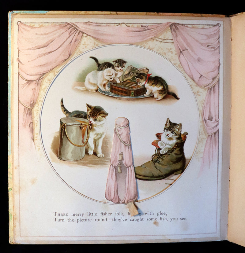 1896 Scarce Nister Revolving Toy Book - IN WONDERLAND with 8 chromolithographed volvelles.