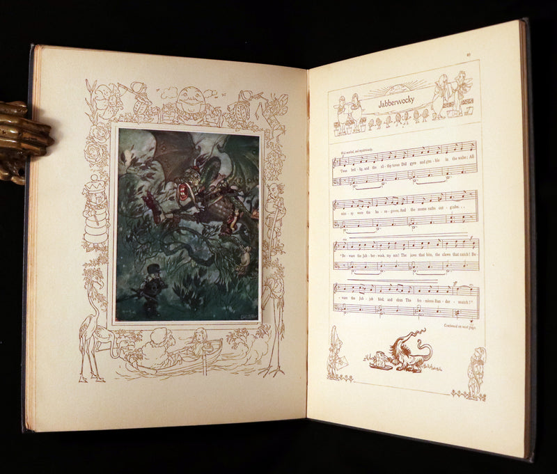 1921 Scarce 1stED - Songs from Alice in Wonderland & Through the Looking-Glass Illustrated by Charles Folkard.
